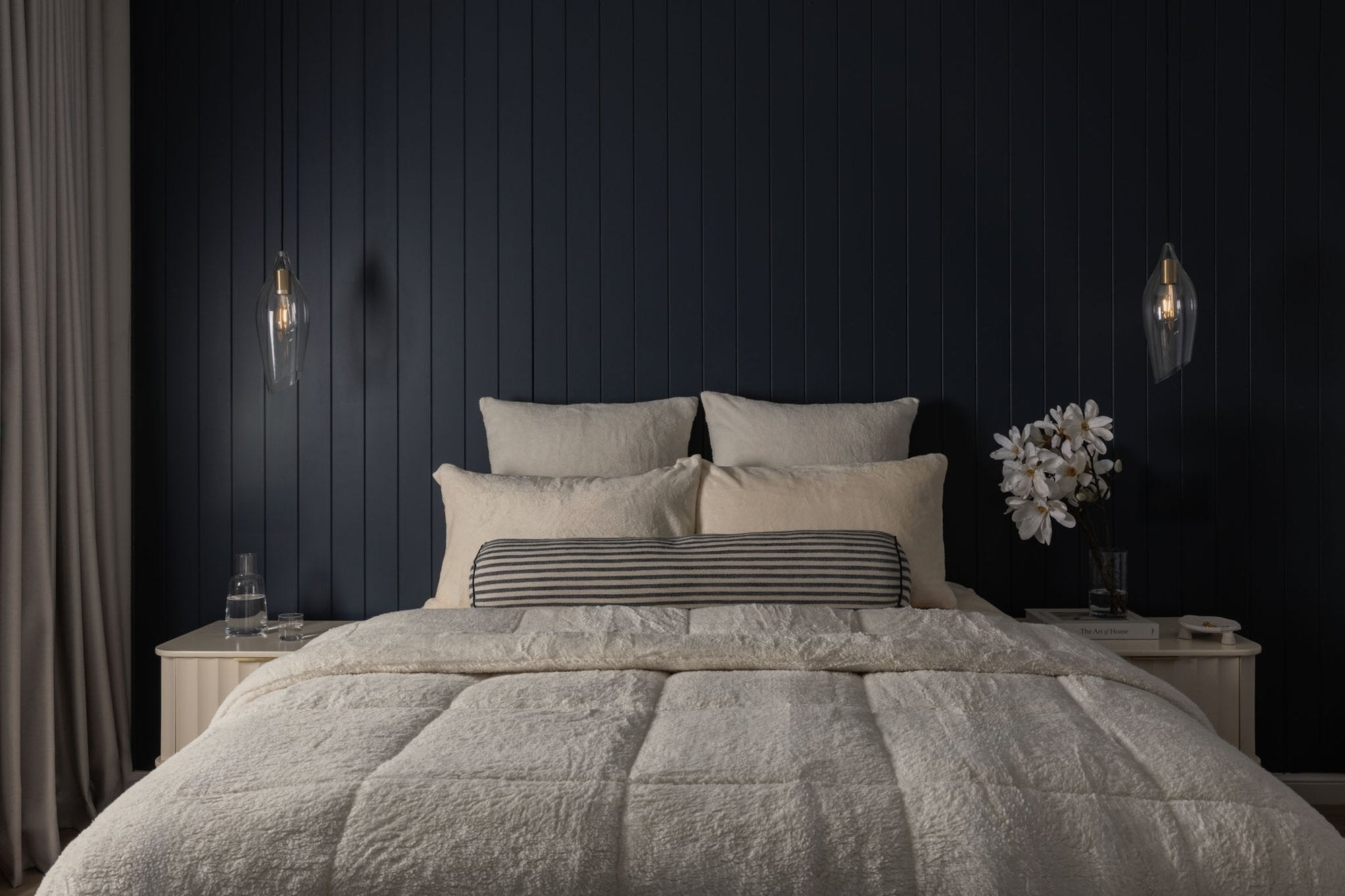 ivory fluffy comforter on bed